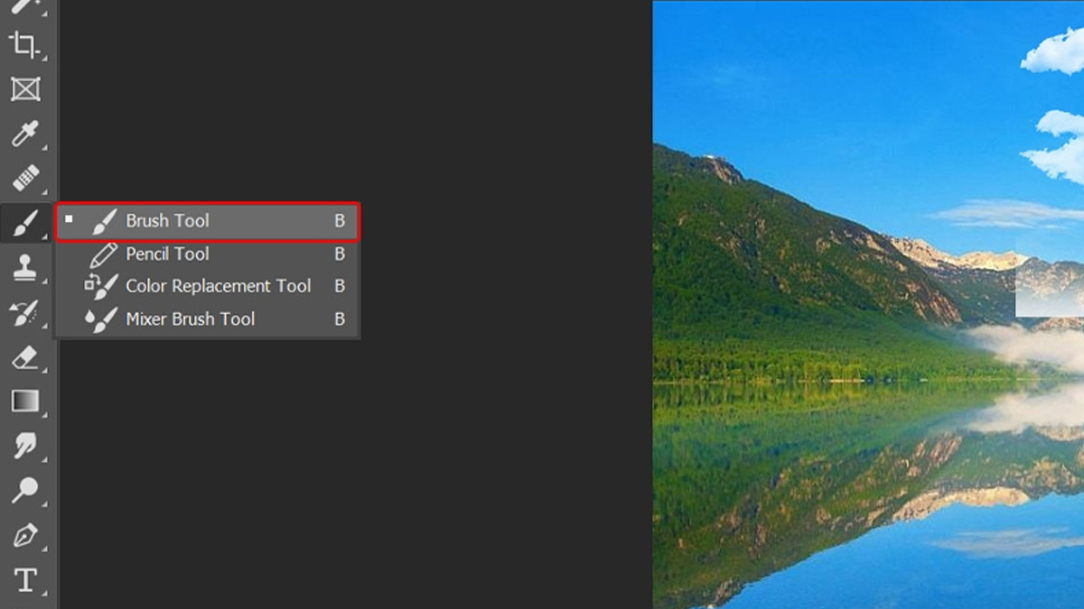 Sử dụng công cụ Brush Tool để xóa phần dư thừa bên ngoài đám mây